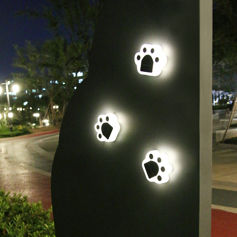 le luci decorative solari di 5000K 70lm inseriscono Cat Paw Print Solar Lawn Lamp