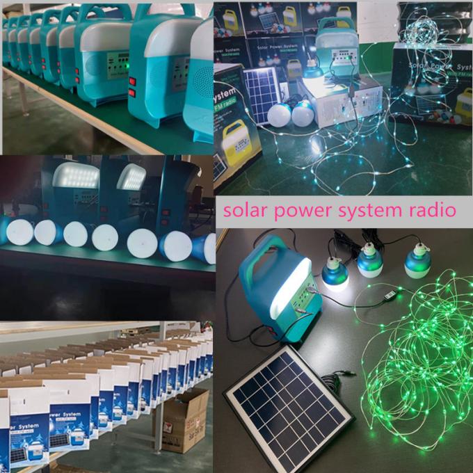 12W corredo portatile del sistema di illuminazione di energia solare delle lampadine del pannello solare 4 LED per la casa con il telefono cellulare che incarica del sostegno